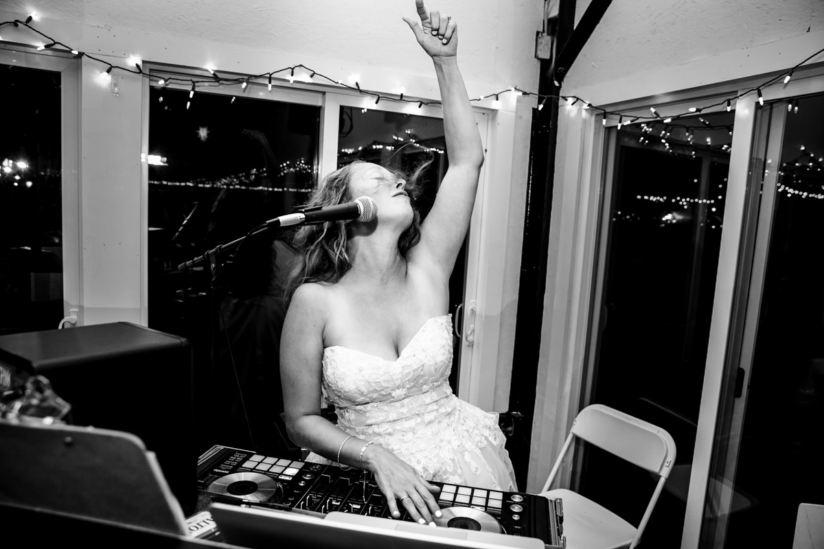 Bride takes over the DJ booth for an insanely fun memory