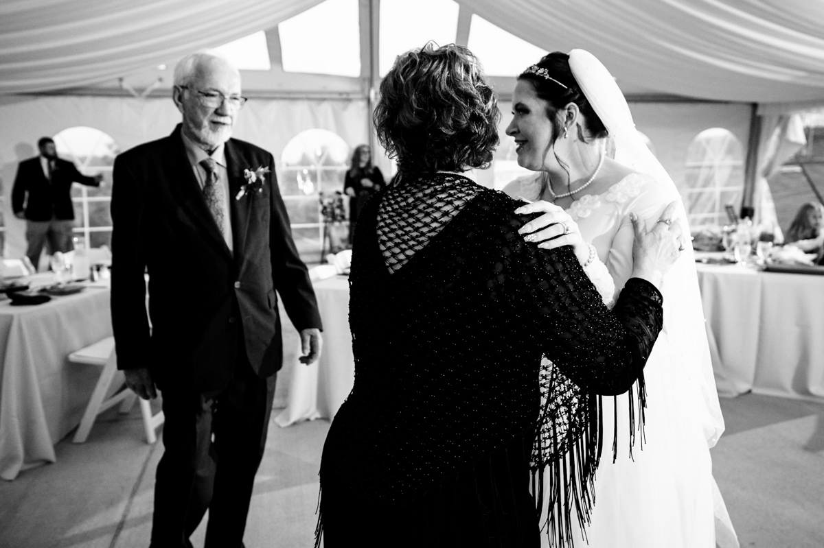 Bride's heartfelt moment with parents at Brown’s Orchard wedding in Loganville, PA