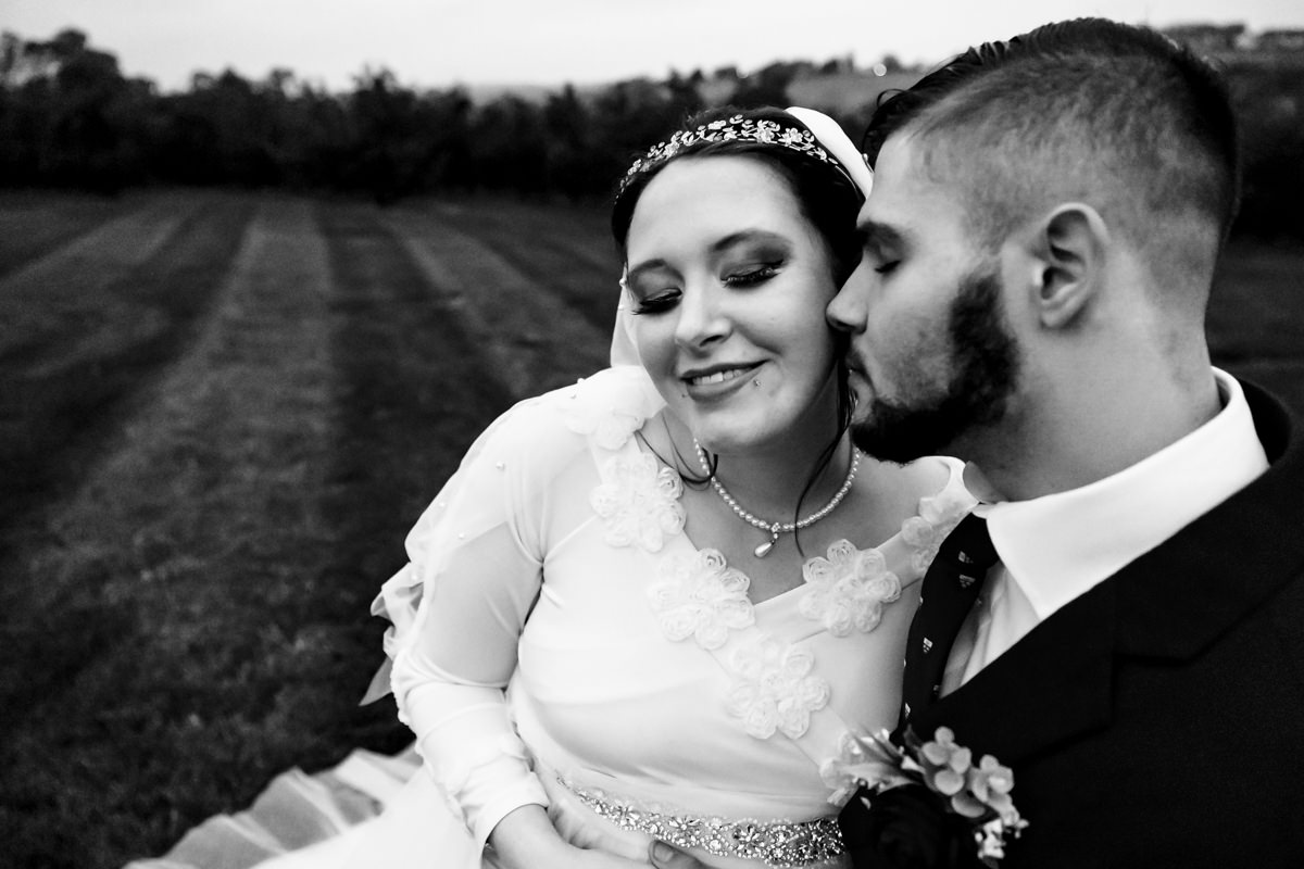 Romantic couple photos in the orchards at a Brown’s Orchard wedding