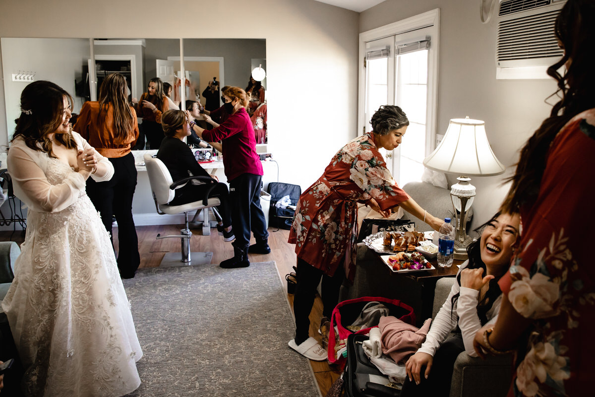 Busy bridal suite while everyone gets ready for the Cameron Estate Inn Wedding