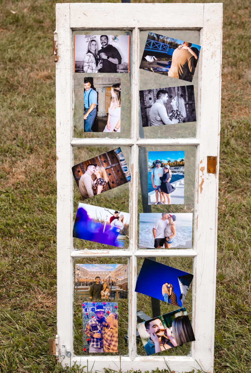 Family heirlooms and old photos set up on an old barn window to emphasize the family farm wedding theme