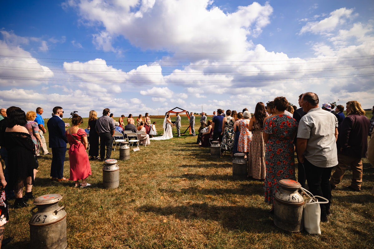 Overall view of the ceremony during a family farm wedding